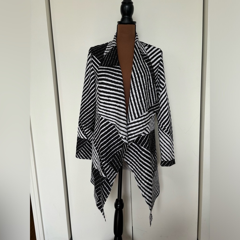 Chico’s TRAVELERS COLLECTION
Crushed Patchwork Striped Jacket size 0